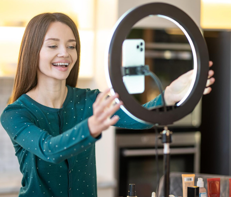 TikTok seller presenting a product with a ring light